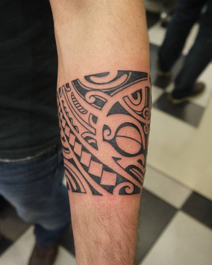 polynesian forearm band tattoo