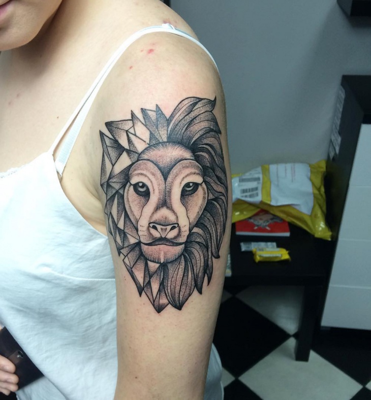 geometric lion tattoo on sleeves