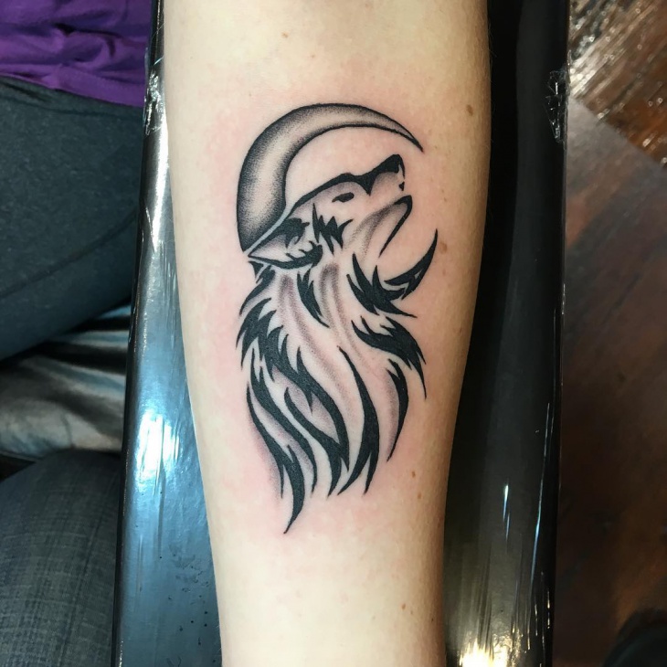 tribal wolf and moon tattoo