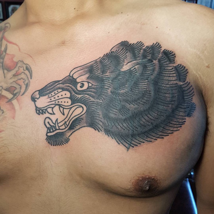 howling wolf tattoo on chest