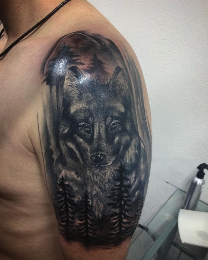 black wolf tattoo on sleeve