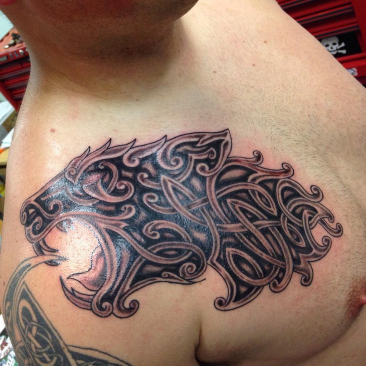celtic knot wolf tattoo on shoulder