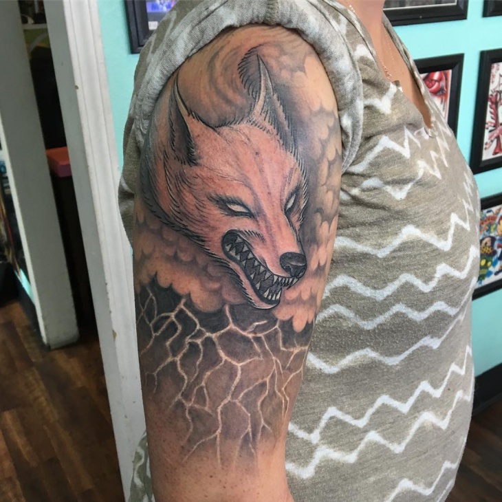 angry wolf face tattoo design