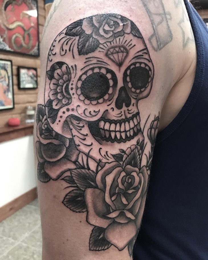 sugar skull arm tattoo