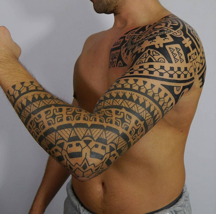 polynesian tribal arm tattoo