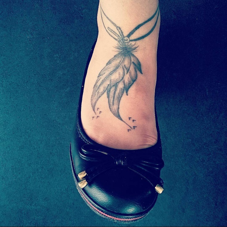 feather foot tattoo for women