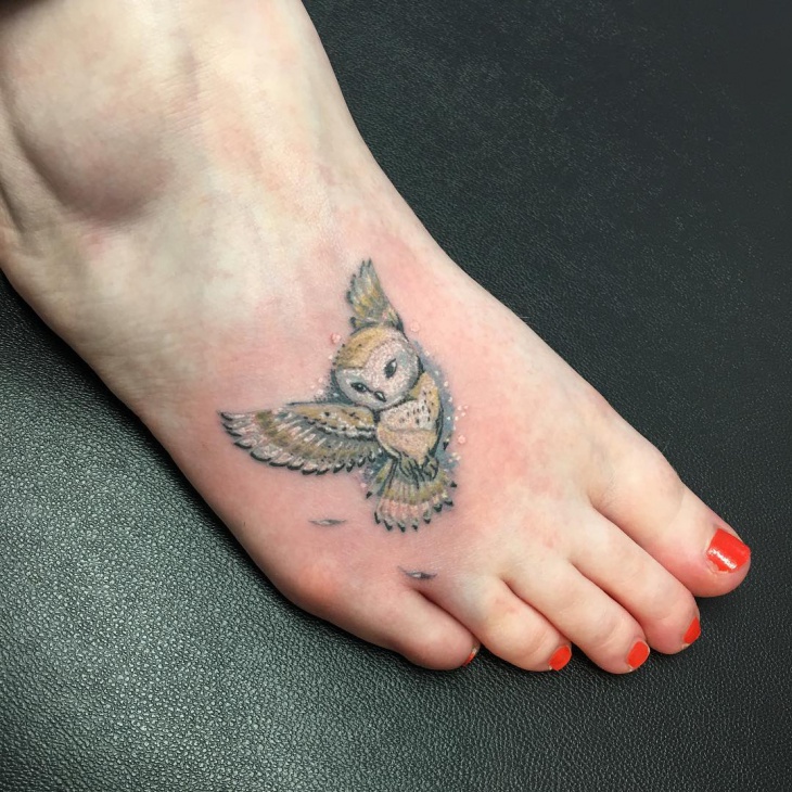 small owl tattoo design on foot