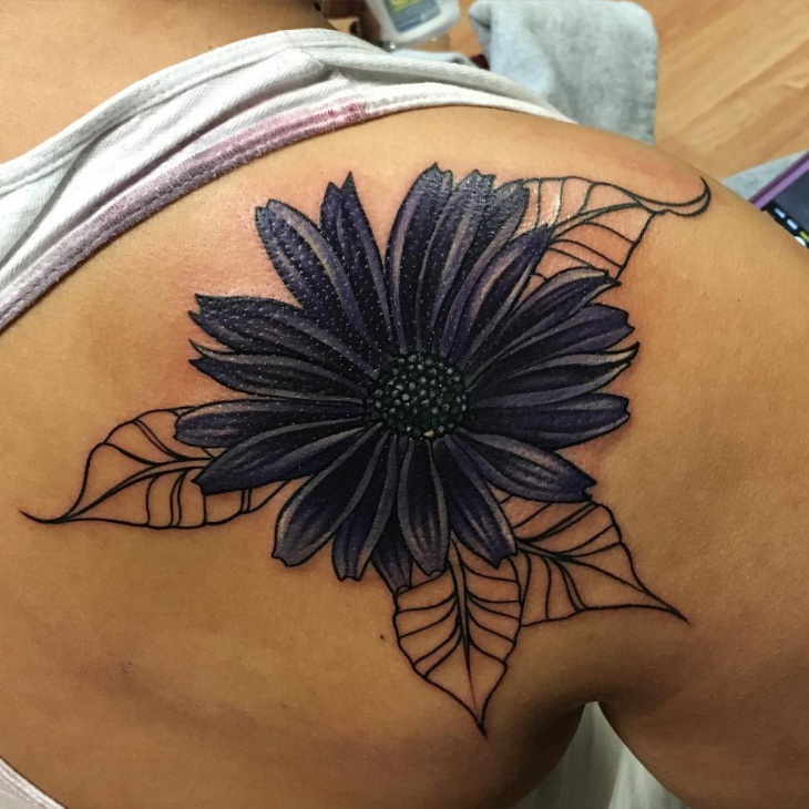 gerbera daisy shoulder tattoo
