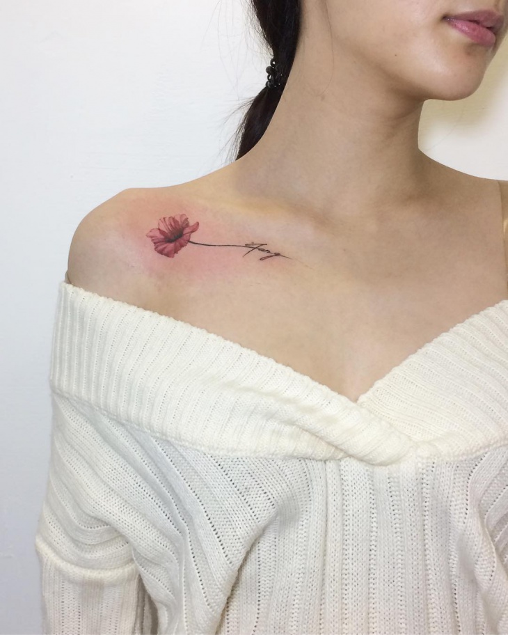 small flower shoulder tattoo