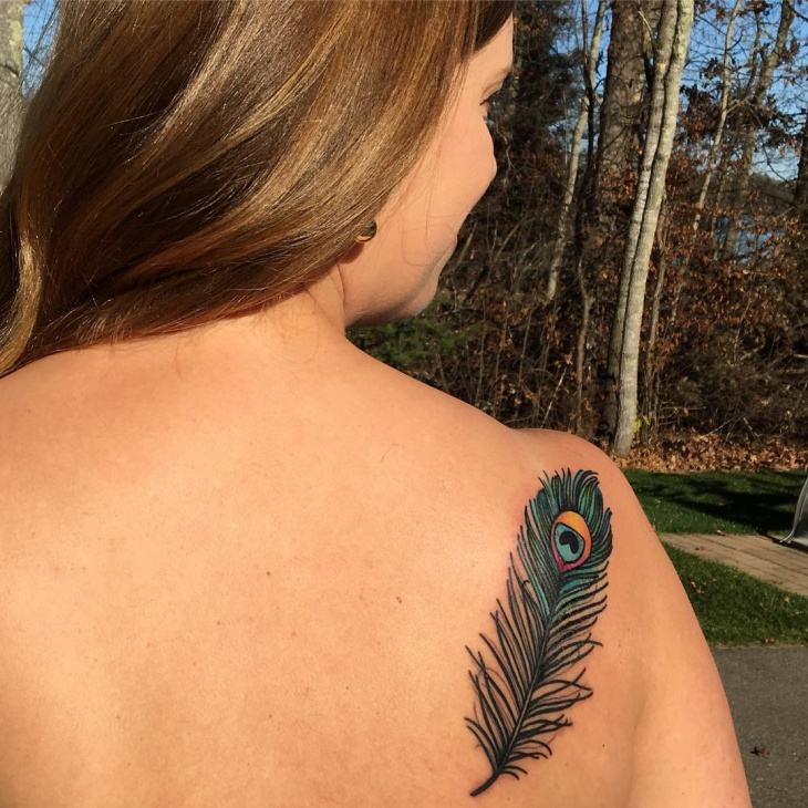 peacock feather tattoo on shoulder