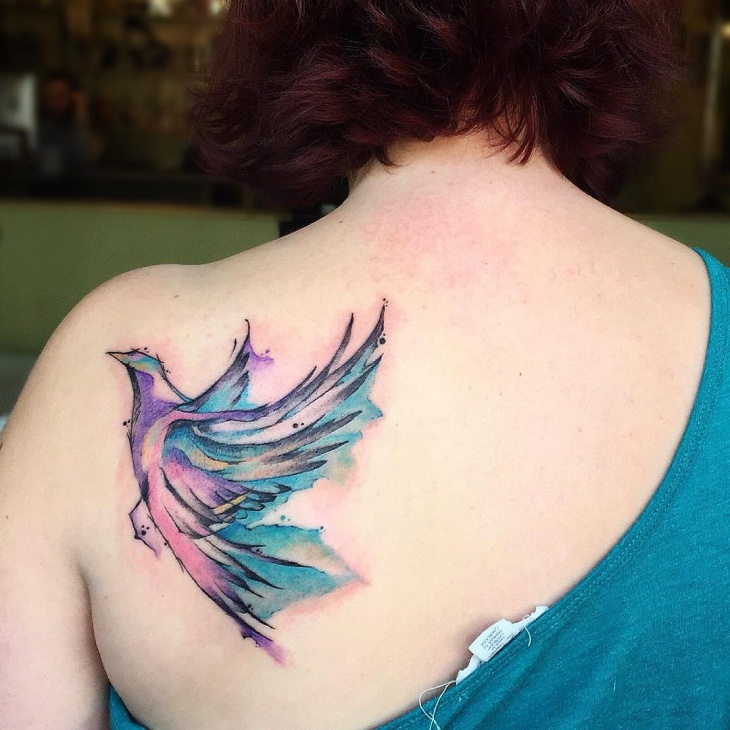 flying bird tattoo on shoulder