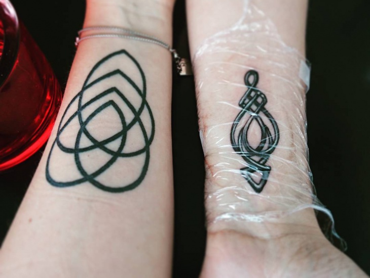 celtic arrow hand tattoo design