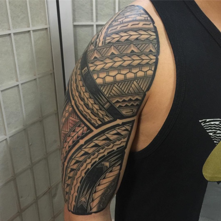 tribal flame half sleeve tattoo