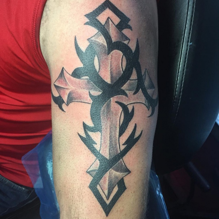 half sleeve tribal cross tattoo