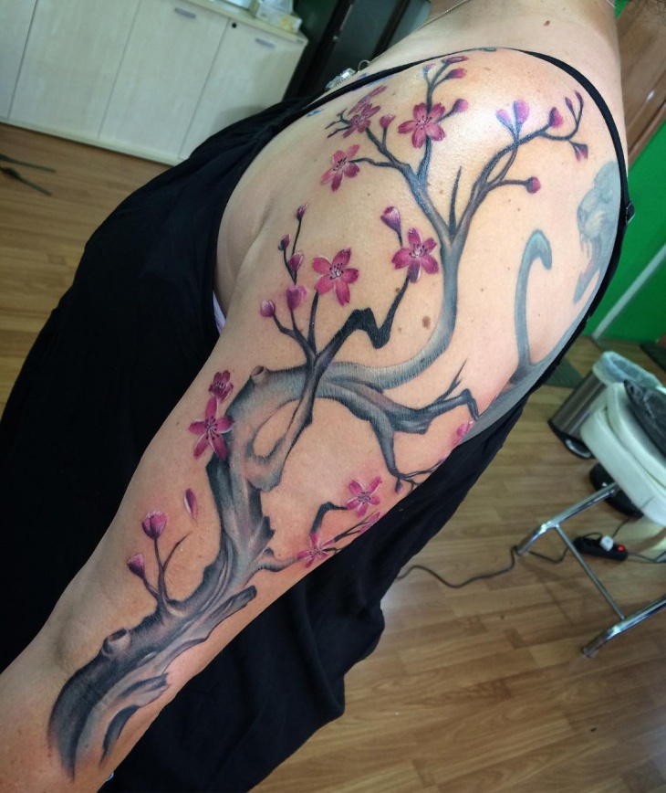 cherry blossom sleeve tree tattoo