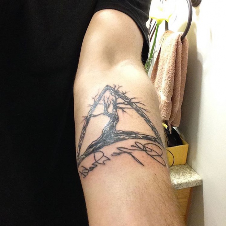 dead tree tattoo arm tattoo