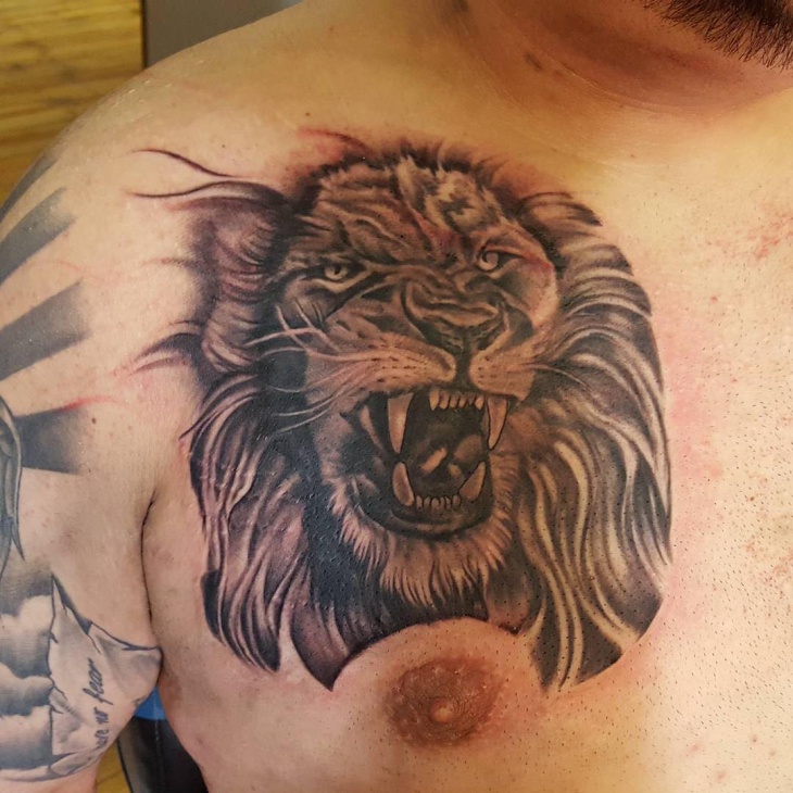 lion head chest tattoo