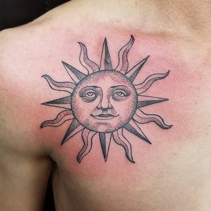 sun chest tattoo for men