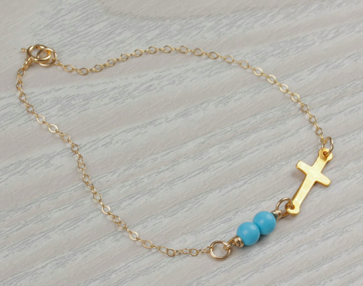 gold sideways cross necklace