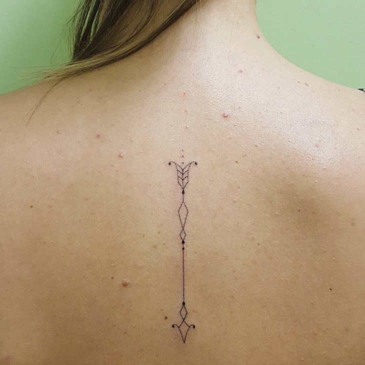 small arrow back tattoo ideas