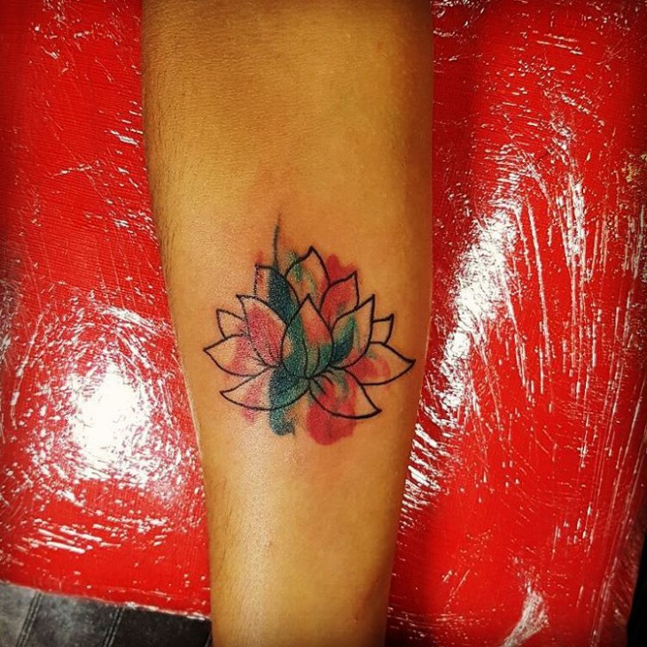 watercolor lotus flower tattoo on wrist