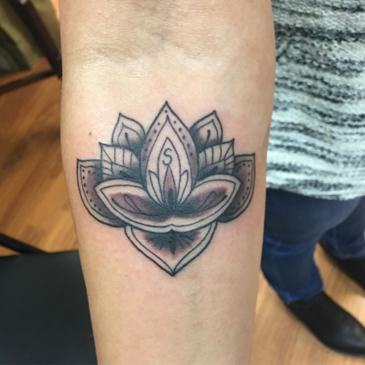 lotus flower inner arm tattoo