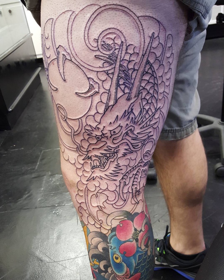 dragon thigh tattoo for men
