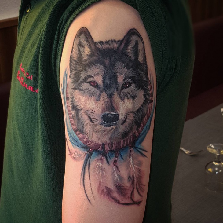 wolf dreamcatcher sleeve tattoo