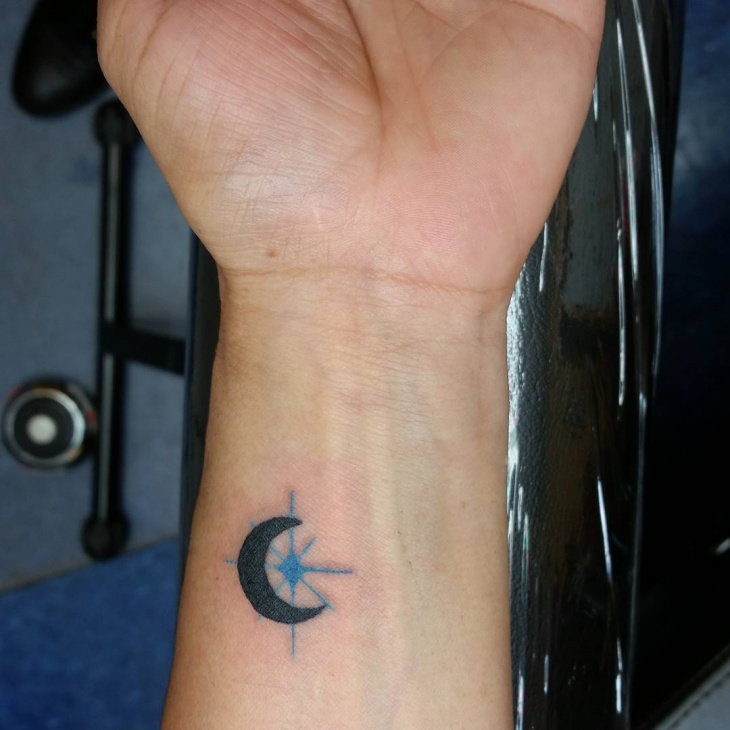 moon and star tattoo on wrist