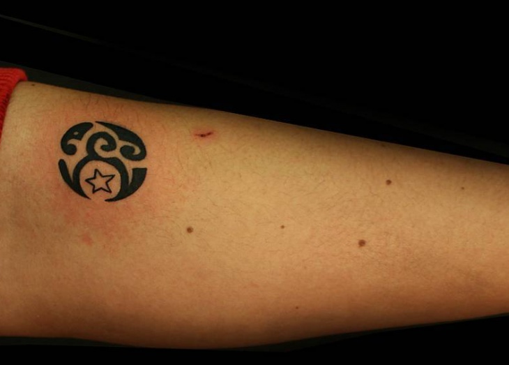 tribal star arm tattoo design