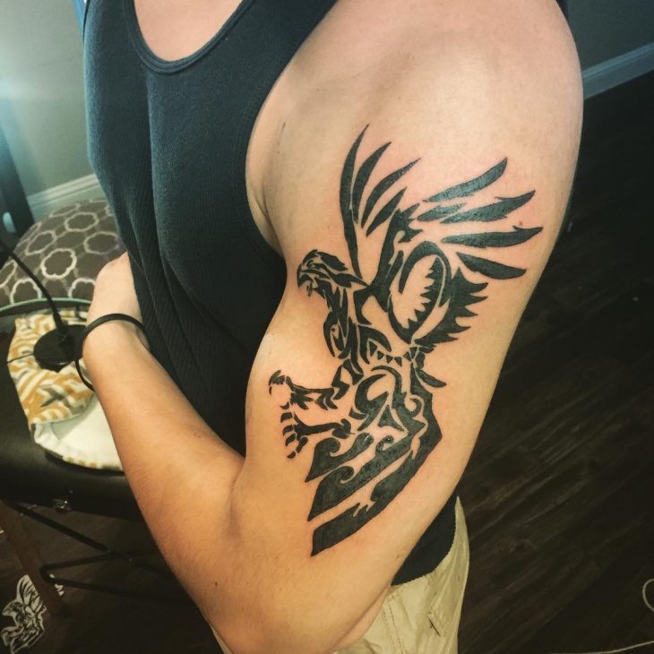 tribal phoenix tattoo on sleeve