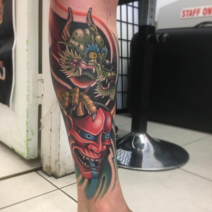 dragon leg tattoo for men