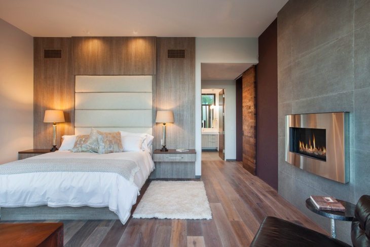 modern master bedroom with fireplace