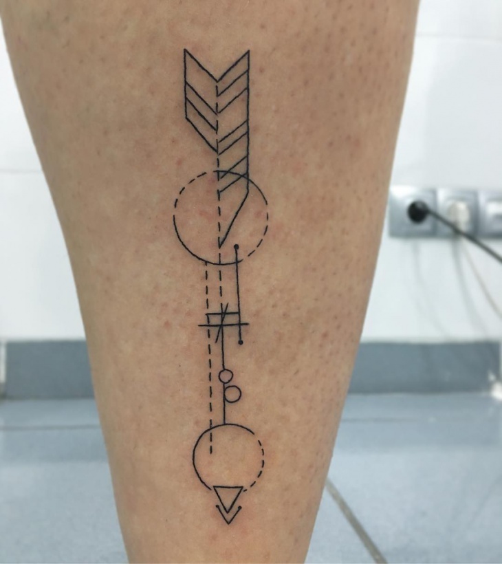 geometric arrow tattoo design on leg