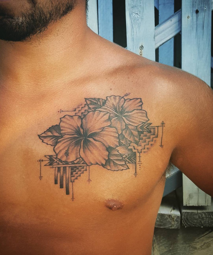 geometric flower tattoo on chest