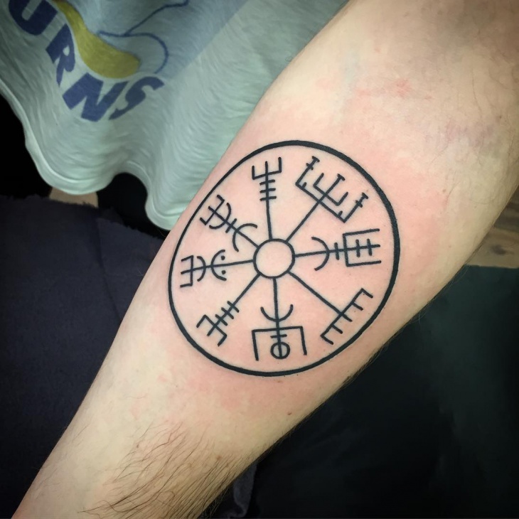 viking compass tattoo on forearm