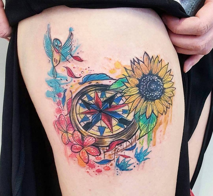 watercolor sunflower tattoo on thigh
