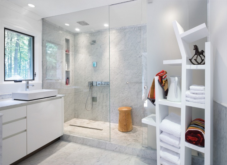 marble walk in shower with glass