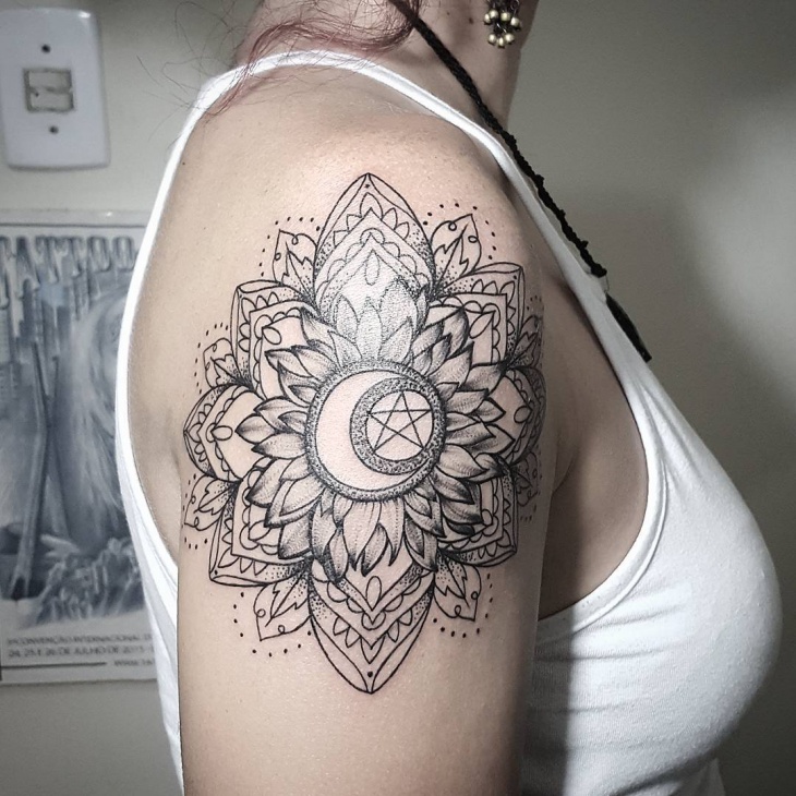 black and white sunflower tattoo on sleeve