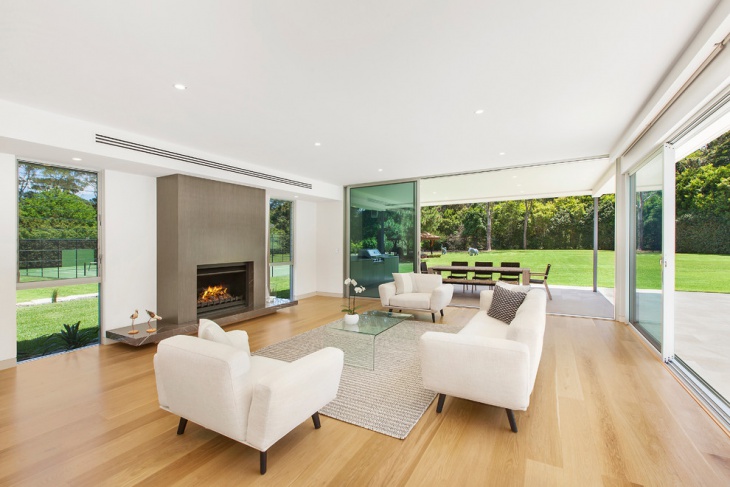 white modern living room with fireplace