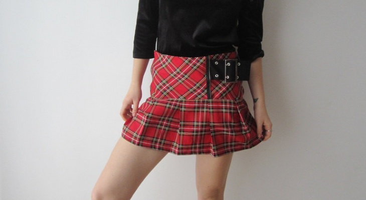 red pleated mini skirt