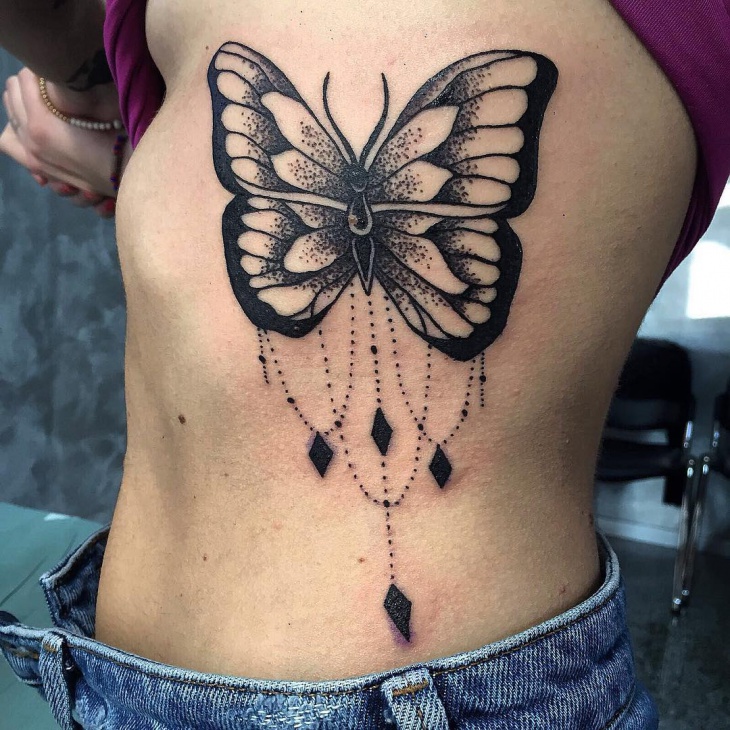 butterfly tummy tuck tattoo