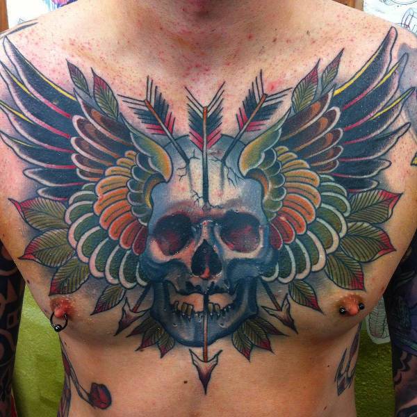 chest wing skull tattoo
