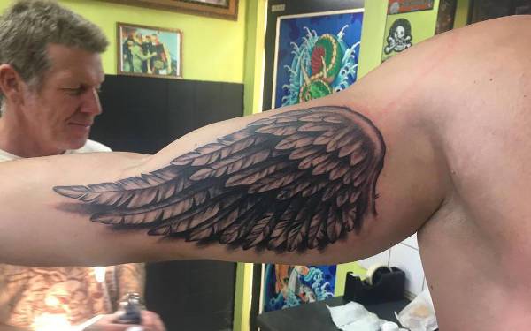 wing inner sleeve tattoo