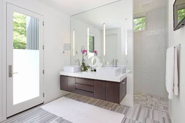 small floating bathroom vanity with mirror