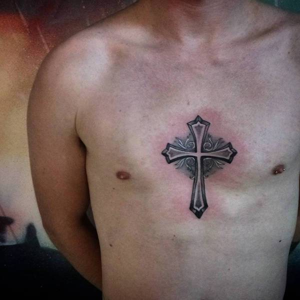 small chest cross tattoo for men
