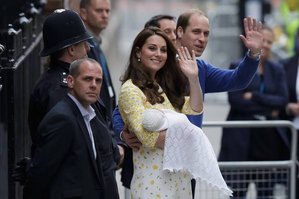 presenting princess charlotte to the world outside st mary’s hospital in 2015