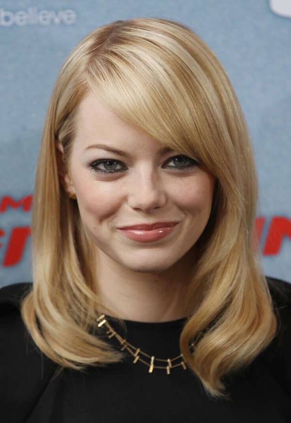 emma stone side swept hairstyle for round face
