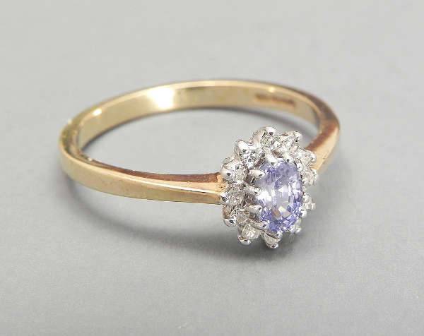 round cluster engagement ring