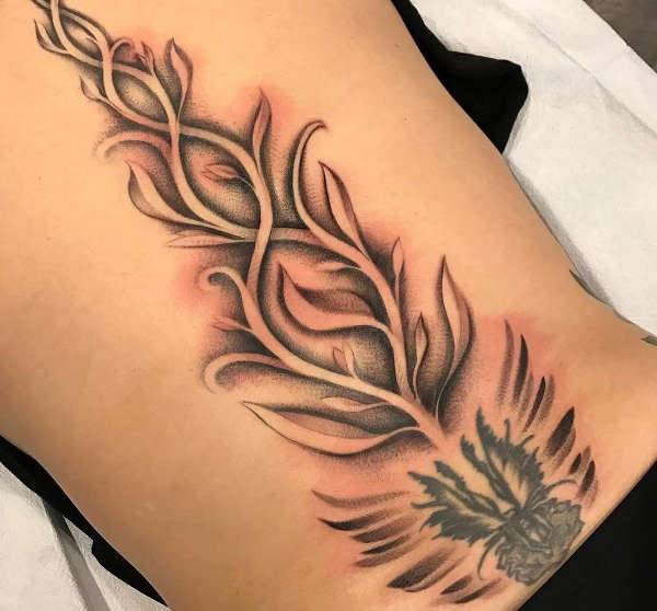tribal spine tattoo design